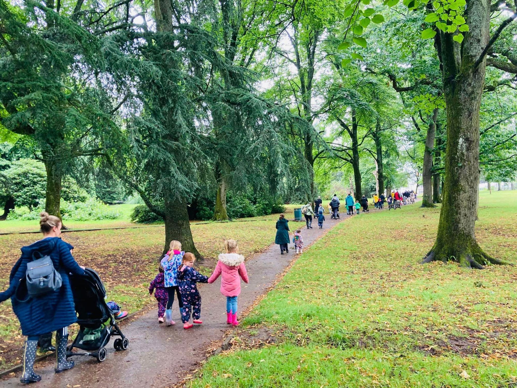 Families on a welly walk in Summer 2023