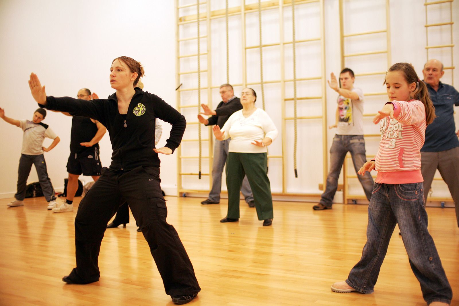 Instructor taking fitness class in the Active Living Centre hall